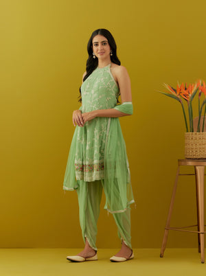 Buy mint green embroidered georgette dhoti suit online in USA with dupatta. Dazzle on weddings and special occasions with exquisite Indian designer dresses, sharara suits, Anarkali suits, bridal lehengas, sharara suits from Pure Elegance Indian clothing store in USA.-side