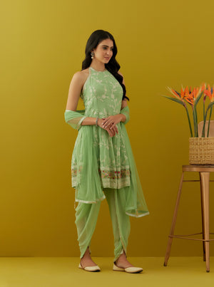 Buy mint green embroidered georgette dhoti suit online in USA with dupatta. Dazzle on weddings and special occasions with exquisite Indian designer dresses, sharara suits, Anarkali suits, bridal lehengas, sharara suits from Pure Elegance Indian clothing store in USA.-right