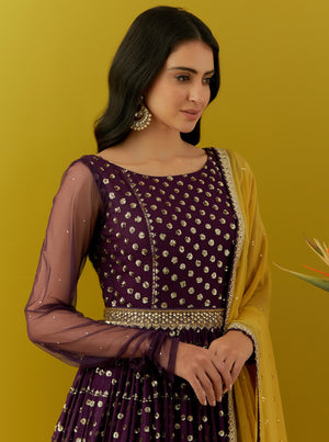 Shop beautiful plum sequin embroidery georgette Anarkali online in USA with yellow dupatta. Dazzle on weddings and special occasions with exquisite Indian designer dresses, sharara suits, Anarkali suits, bridal lehengas, sharara suits from Pure Elegance Indian clothing store in USA.-closeup
