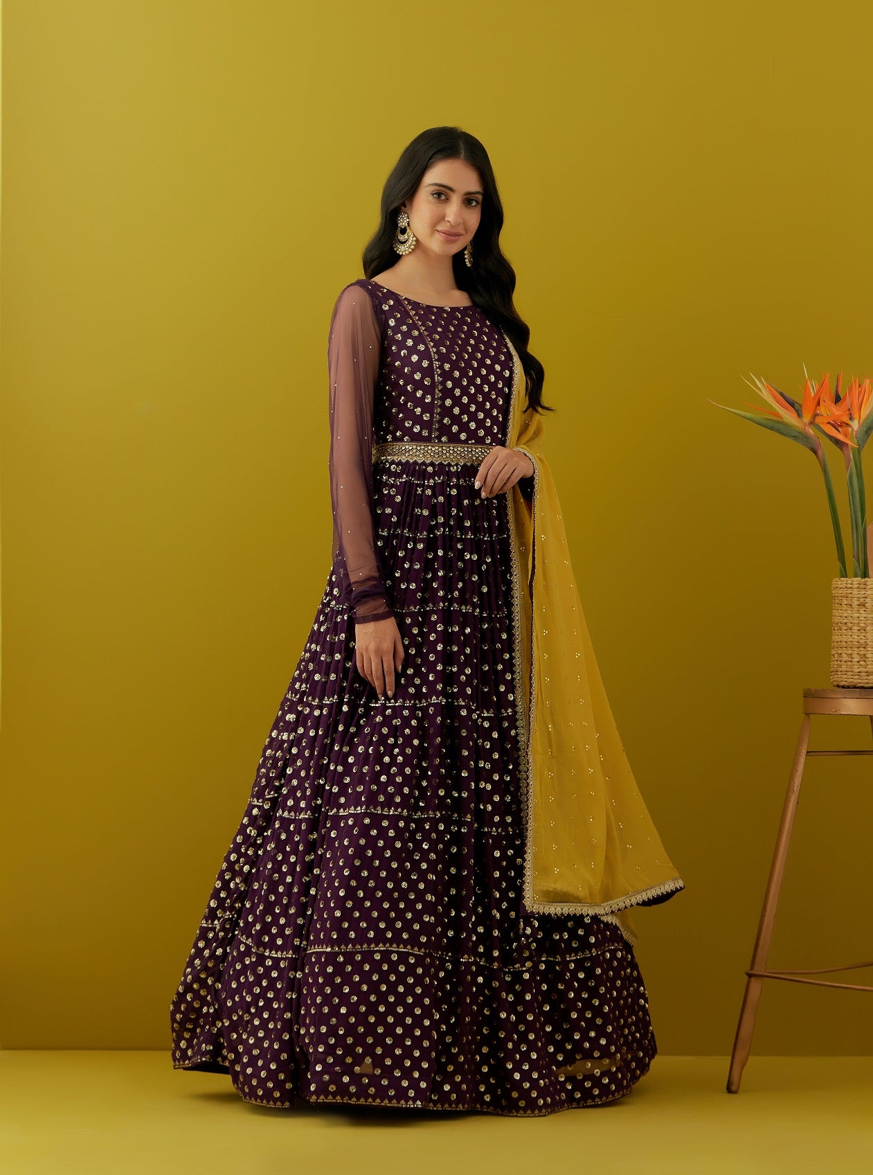 Shop beautiful plum sequin embroidery georgette Anarkali online in USA with yellow dupatta. Dazzle on weddings and special occasions with exquisite Indian designer dresses, sharara suits, Anarkali suits, bridal lehengas, sharara suits from Pure Elegance Indian clothing store in USA.-side