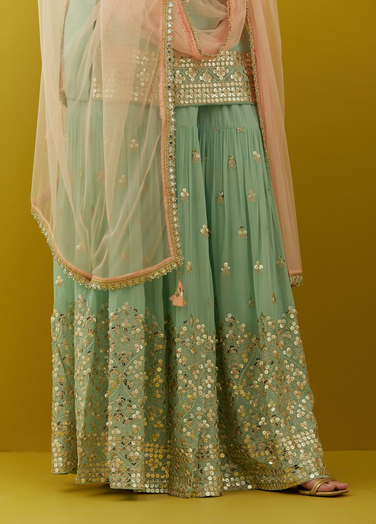 Buy beautiful aqua green embroidered sharara suit online in USA with peach dupatta. Dazzle on weddings and special occasions with exquisite Indian designer dresses, sharara suits, Anarkali suits, bridal lehengas, sharara suits from Pure Elegance Indian clothing store in USA.-sharara