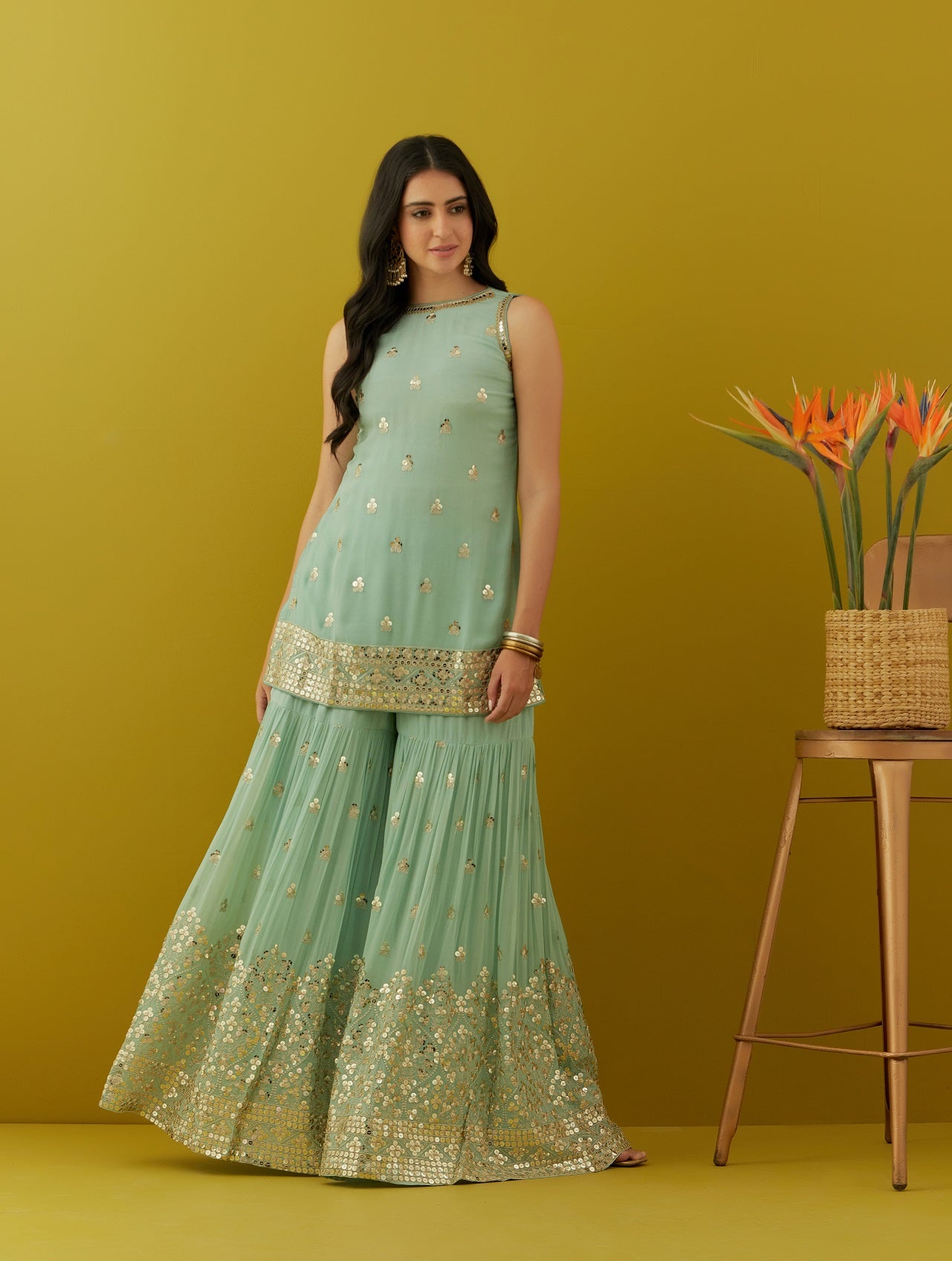 Buy beautiful aqua green embroidered sharara suit online in USA with peach dupatta. Dazzle on weddings and special occasions with exquisite Indian designer dresses, sharara suits, Anarkali suits, bridal lehengas, sharara suits from Pure Elegance Indian clothing store in USA.-front