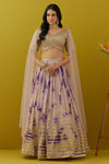 Buy beautiful powder pink tie and dye sequin embroidery lehenga online in USA with attached dupatta. Dazzle on weddings and special occasions with exquisite Indian designer dresses, sharara suits, Anarkali suits, bridal lehengas, sharara suits from Pure Elegance Indian clothing store in USA.-front