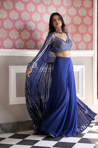 Shop beautiful blue embroidered crop top with sharara online in USA with jacket. Dazzle on weddings and special occasions with exquisite Indian designer dresses, sharara suits, Anarkali suits, bridal lehengas, sharara suits from Pure Elegance Indian clothing store in USA.-full view