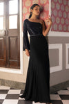 Beautiful black sequinned embroidered one-sided full sleeves and other side strappy sleeves gown. This gown is perfect for cocktail parties. Dazzle on weddings and special occasions with exquisite Indian designer dresses, sharara suits, Anarkali suits, and wedding lehengas from Pure Elegance Indian fashion store in the USA.
