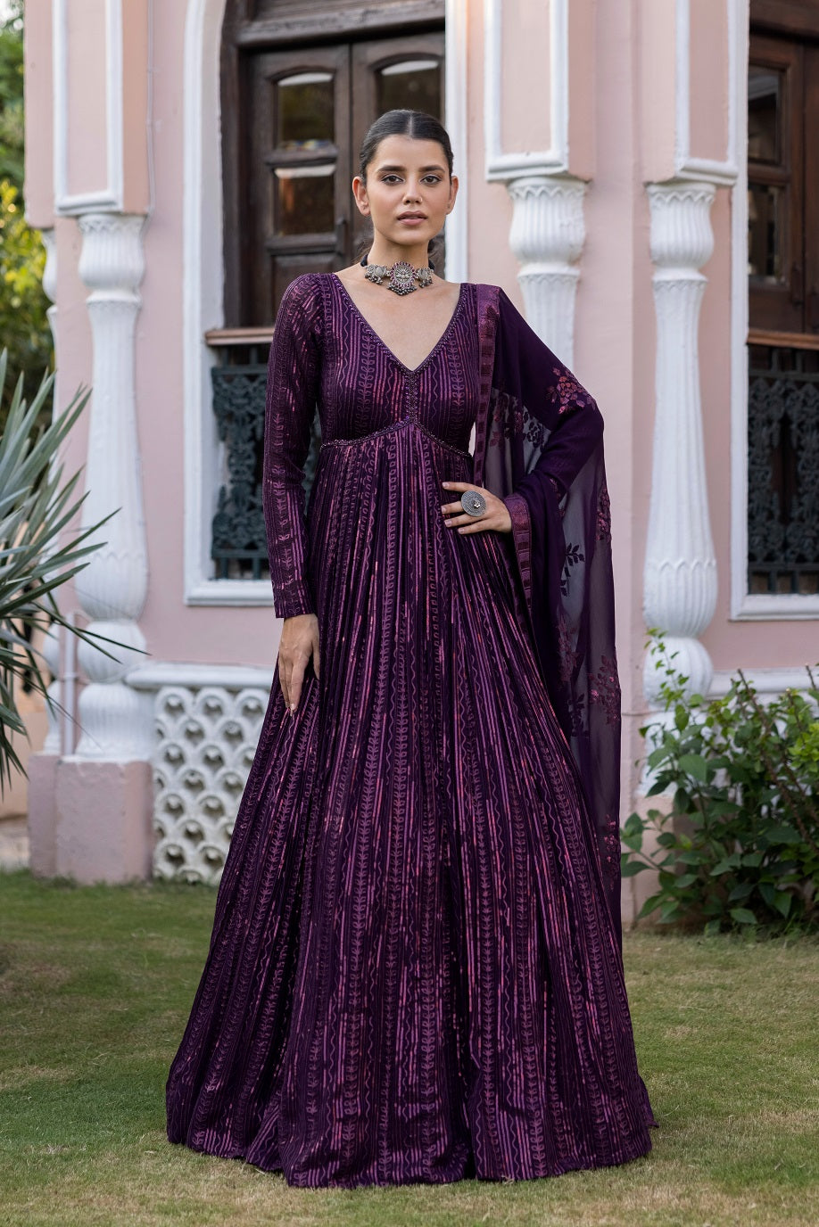 Shop the cynosure of all eyes as you flaunt this set of wine gowns with sequin embroidery all over, full sleeves, and a net wine dupatta from Pure Elegance. Complete the look by wearing statement jewelry and heels. Perfect for functions and parties. Buy the look from Pure Elegance Indian clothing store in the USA online now.