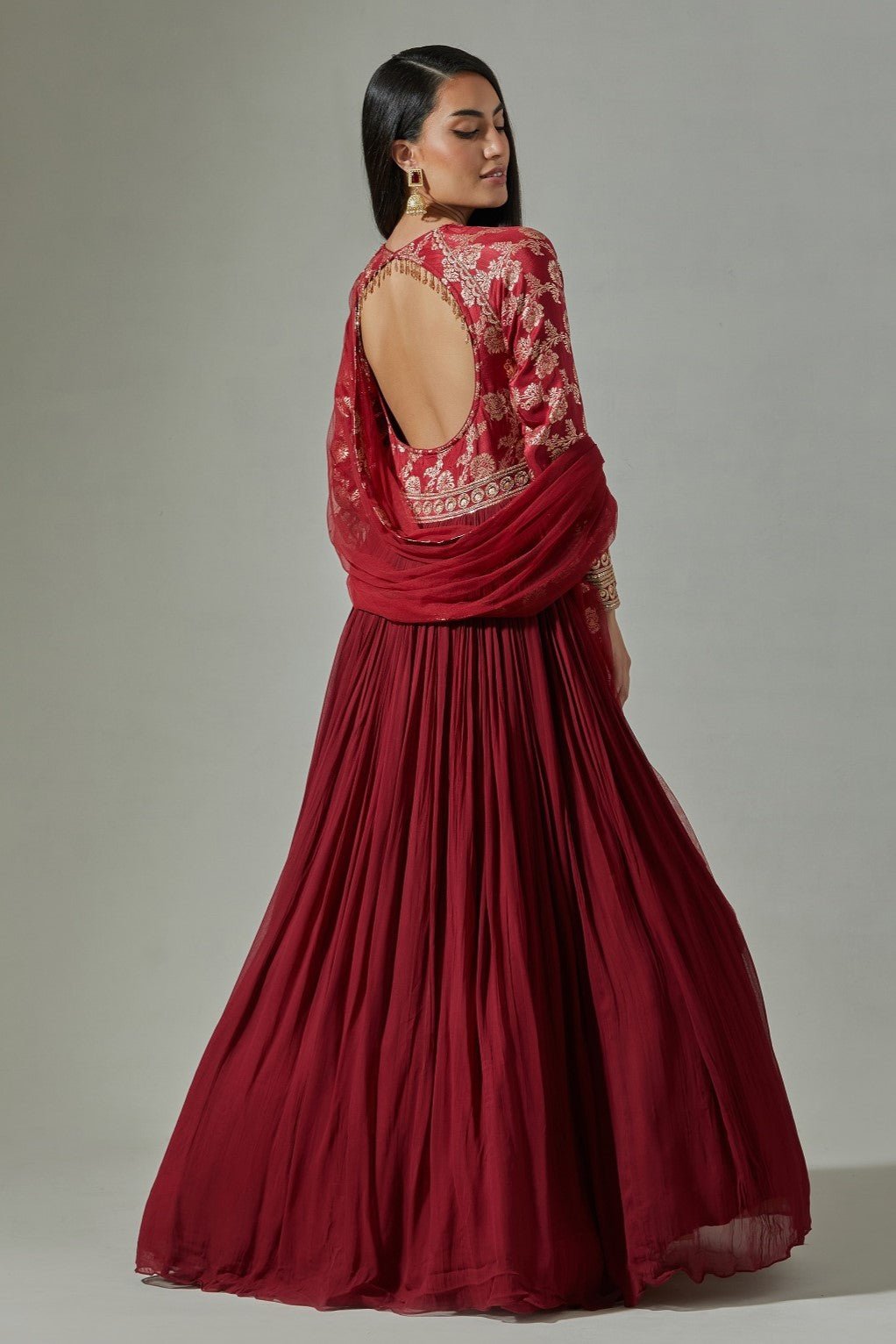 Buy beautiful maroon georgette Anarkali online in USA with embroidered Banarasi yoke. Dazzle on weddings and special occasions with exquisite Indian designer dresses, sharara suits, Anarkali suits, wedding lehengas from Pure Elegance Indian fashion store in USA.-back