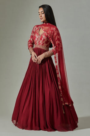 Buy beautiful maroon georgette Anarkali online in USA with embroidered Banarasi yoke. Dazzle on weddings and special occasions with exquisite Indian designer dresses, sharara suits, Anarkali suits, wedding lehengas from Pure Elegance Indian fashion store in USA.-Anarkali