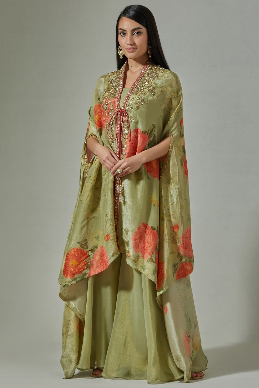 Buy beautiful pista green embroidered floral cape online in USA with sharara. Dazzle on weddings and special occasions with exquisite Indian designer dresses, sharara suits, Anarkali suits, wedding lehengas from Pure Elegance Indian fashion store in USA.-full view