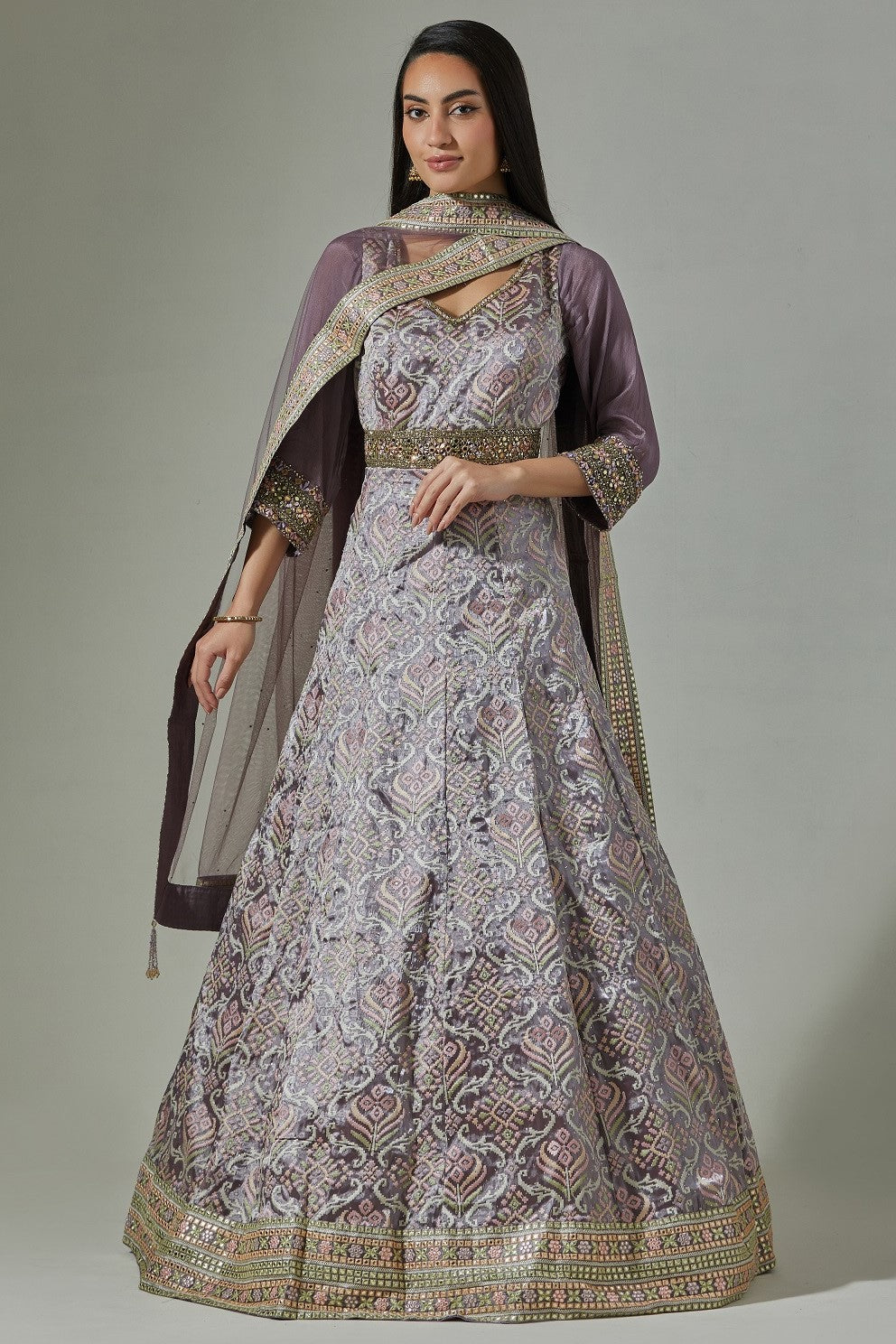 Shop beautiful lilac jacquard weave embroidered Anarkali suit online in USA. Dazzle on weddings and special occasions with exquisite Indian designer dresses, sharara suits, Anarkali suits, wedding lehengas from Pure Elegance Indian fashion store in USA.-full view