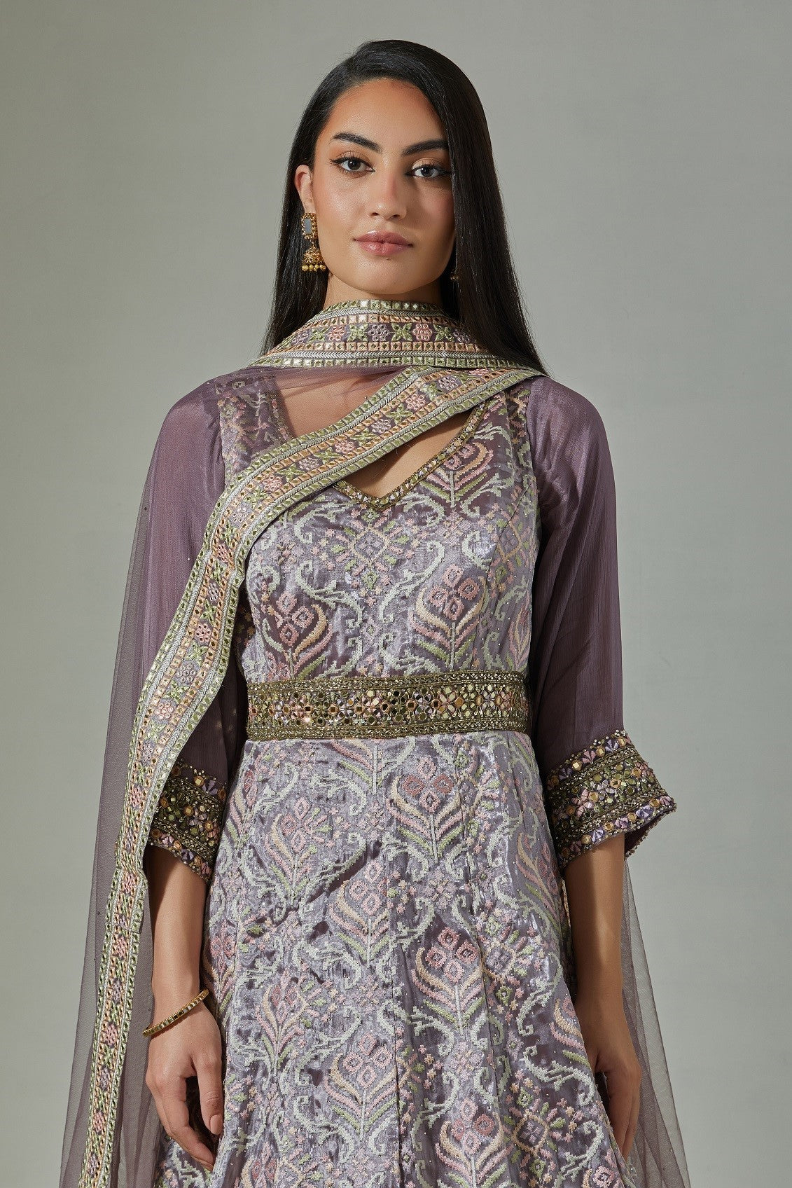 Shop beautiful lilac jacquard weave embroidered Anarkali suit online in USA. Dazzle on weddings and special occasions with exquisite Indian designer dresses, sharara suits, Anarkali suits, wedding lehengas from Pure Elegance Indian fashion store in USA.-closeup