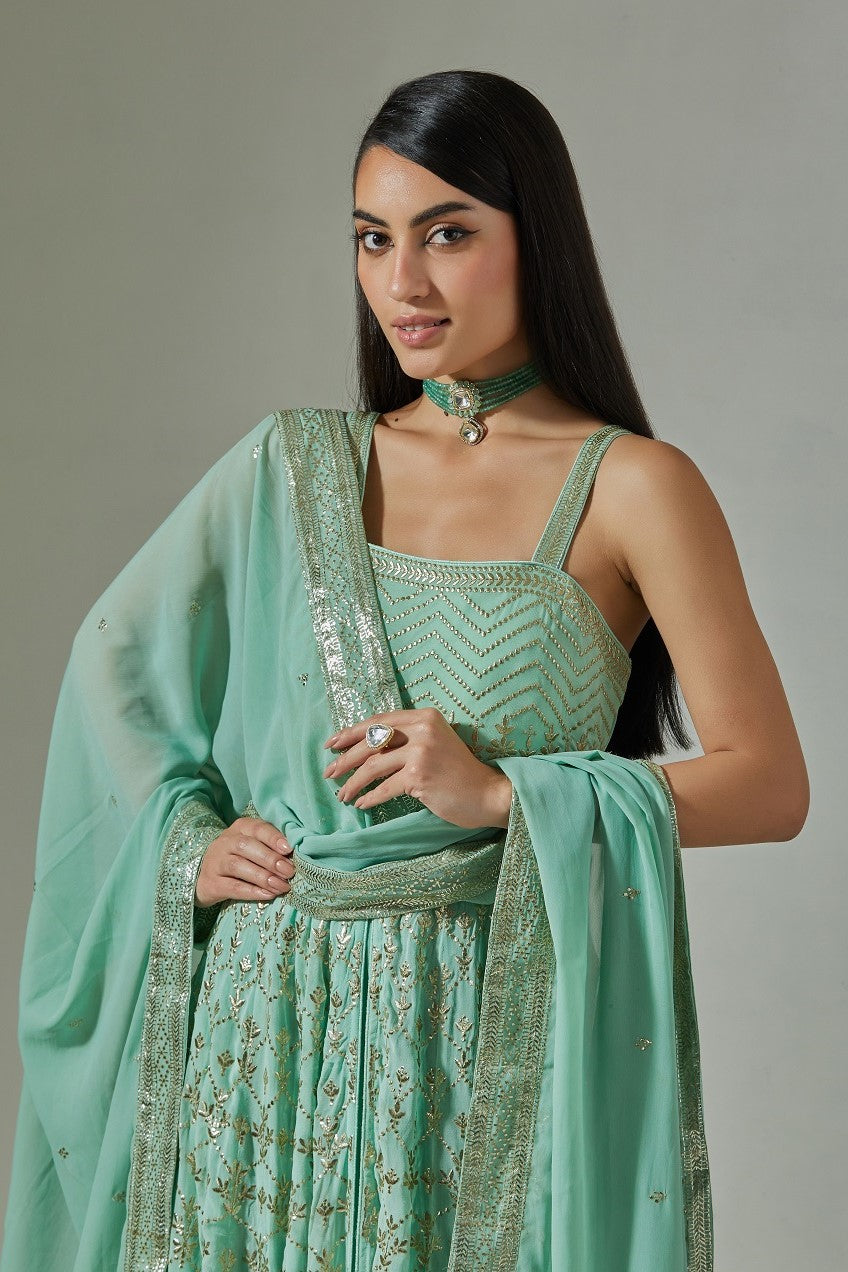 Buy beautiful sea green embroidered floorlength Anarkali suit online in USA. Dazzle on weddings and special occasions with exquisite Indian designer dresses, sharara suits, Anarkali suits, wedding lehengas from Pure Elegance Indian fashion store in USA.-closeup