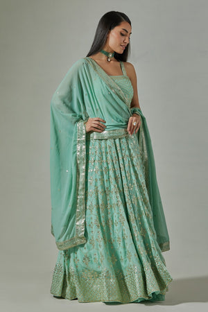 Buy beautiful sea green embroidered floorlength Anarkali suit online in USA. Dazzle on weddings and special occasions with exquisite Indian designer dresses, sharara suits, Anarkali suits, wedding lehengas from Pure Elegance Indian fashion store in USA.-side