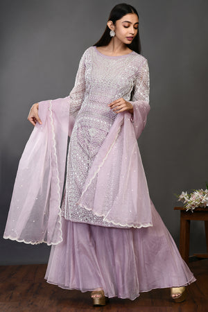 Buy lilac pearl and cutdana work organza sharara suit online in USA with dupatta. Dazzle on weddings and special occasions with exquisite Indian designer dresses, sharara suits, Anarkali suits, wedding lehengas from Pure Elegance Indian fashion store in USA.-front