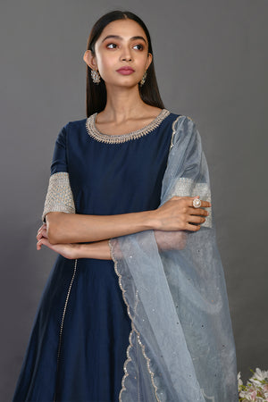 Shop navy blue floorlength chanderi Anarkali suit online in USA with dupatta. Dazzle on weddings and special occasions with exquisite Indian designer dresses, sharara suits, Anarkali suits, wedding lehengas from Pure Elegance Indian fashion store in USA.-closeup