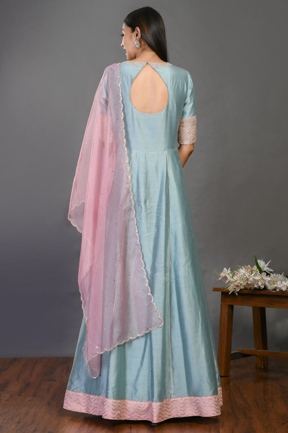 Buy aqua blue floorlength chanderi Anarkali suit online in USA with dupatta. Dazzle on weddings and special occasions with exquisite Indian designer dresses, sharara suits, Anarkali suits, wedding lehengas from Pure Elegance Indian fashion store in USA.-back
