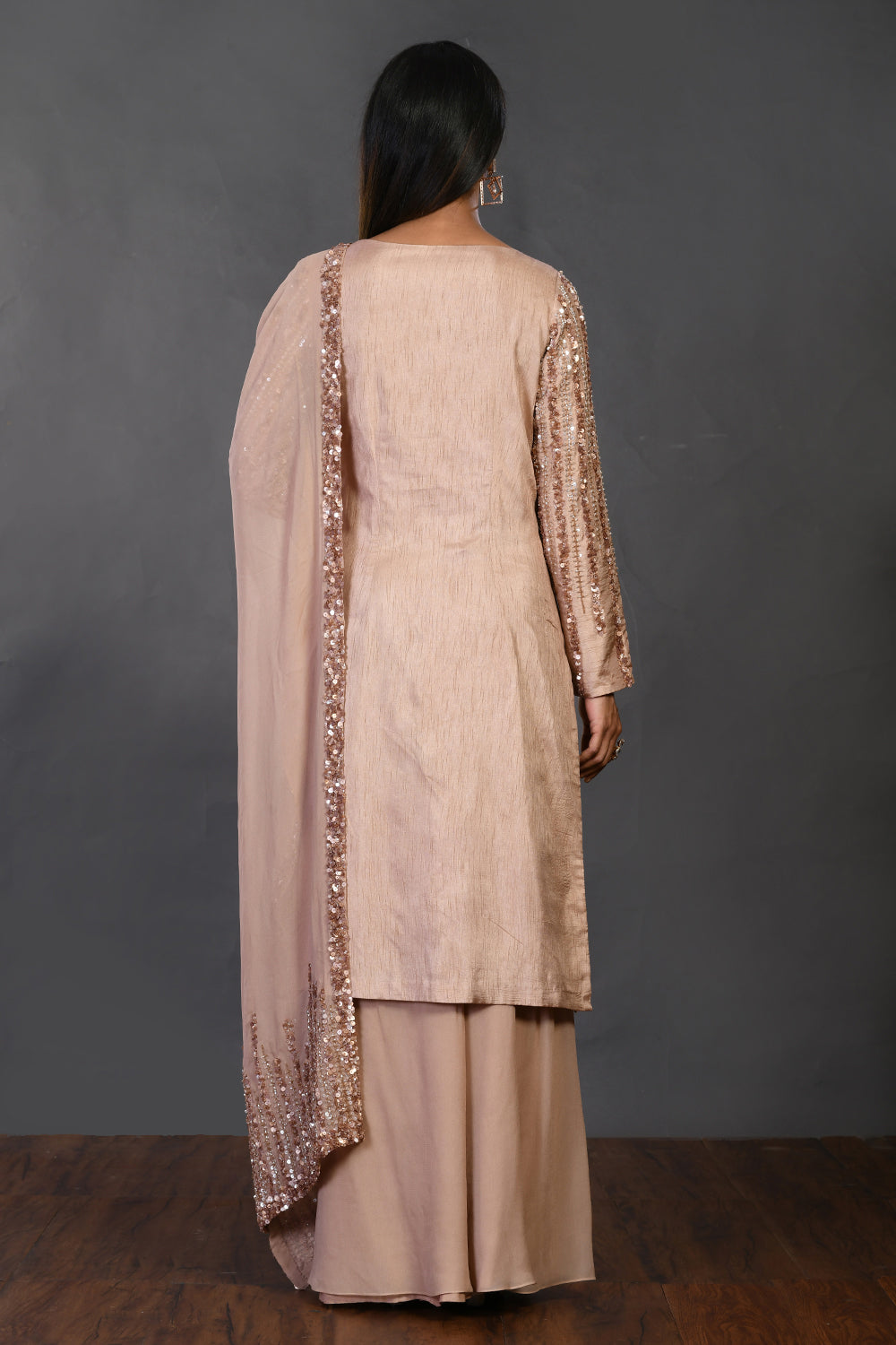 Shop beige embellished Mysore silk suit online in USA with dupatta. Dazzle on weddings and special occasions with exquisite Indian designer dresses, sharara suits, Anarkali suits, wedding lehengas from Pure Elegance Indian fashion store in USA.-back
