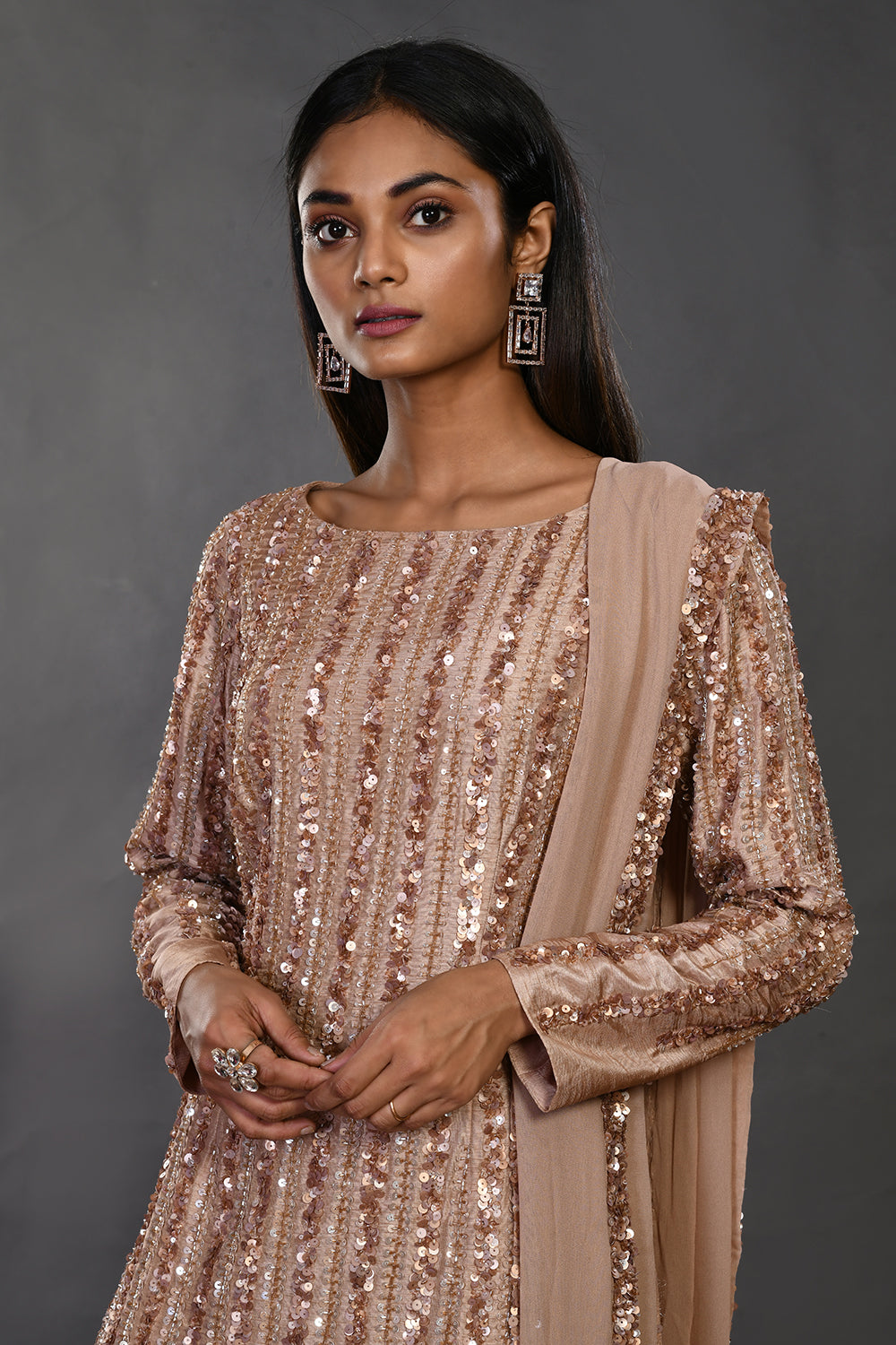 Shop beige embellished Mysore silk suit online in USA with dupatta. Dazzle on weddings and special occasions with exquisite Indian designer dresses, sharara suits, Anarkali suits, wedding lehengas from Pure Elegance Indian fashion store in USA.-closeup