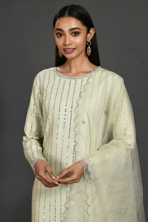 Buy mint green mirror work silk suit online in USA with organza dupatta. Dazzle on weddings and special occasions with exquisite Indian designer dresses, sharara suits, Anarkali suits, wedding lehengas from Pure Elegance Indian fashion store in USA.-closeup