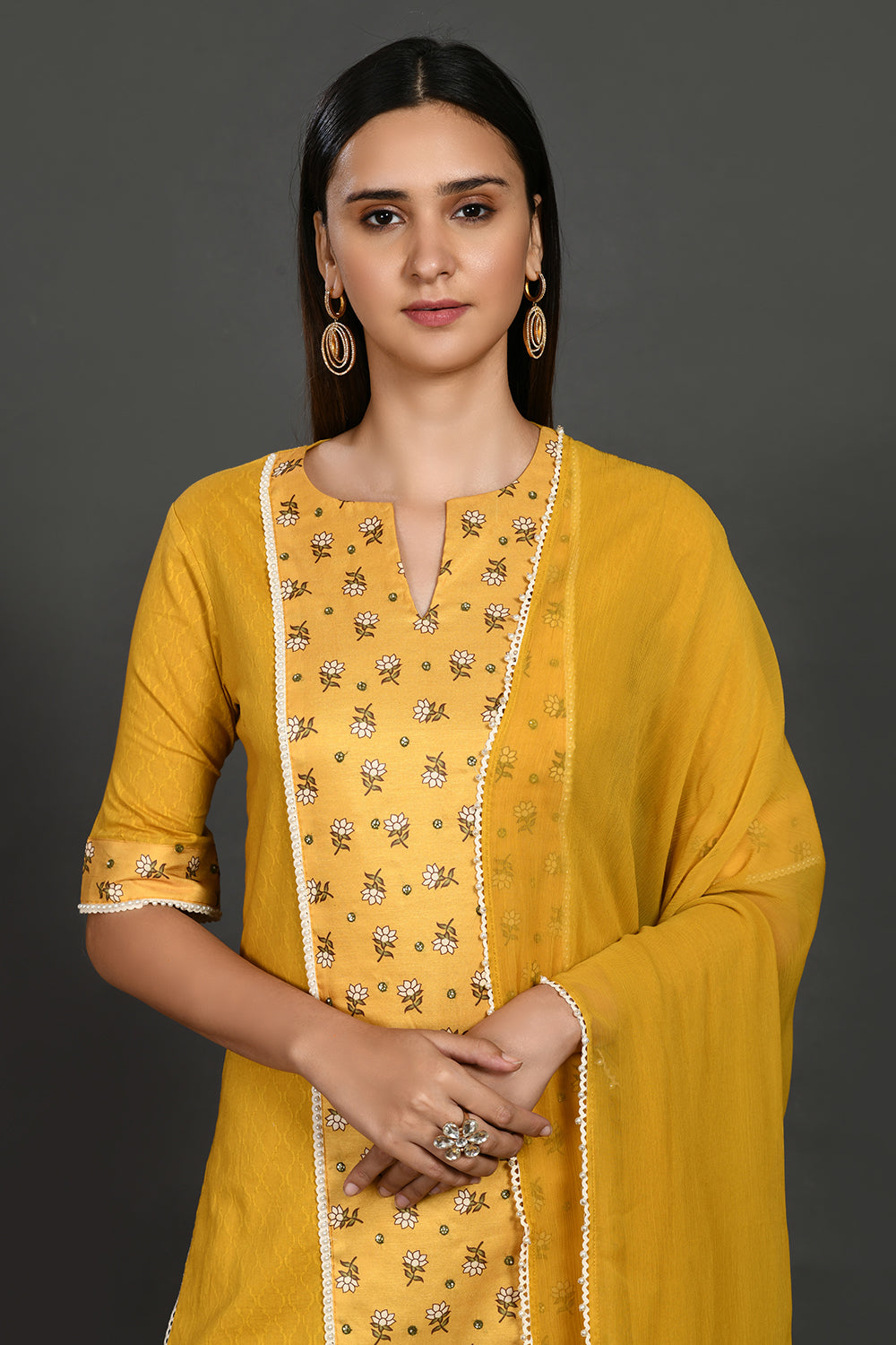 Shop yellow stone and pearl work chanderi suit online in USA with dupatta. Dazzle on weddings and special occasions with exquisite Indian designer dresses, sharara suits, Anarkali suits, wedding lehengas from Pure Elegance Indian fashion store in USA.-closeup