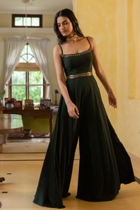 Buy a beautiful green lightwork embroidered georgette jumpsuit with an embroidered belt. The suit is perfect for occasions like dinners and parties. Dazzle on weddings and special occasions with exquisite Indian designer dresses, sharara suits, Anarkali suits, and wedding lehengas from Pure Elegance Indian fashion store in USA.