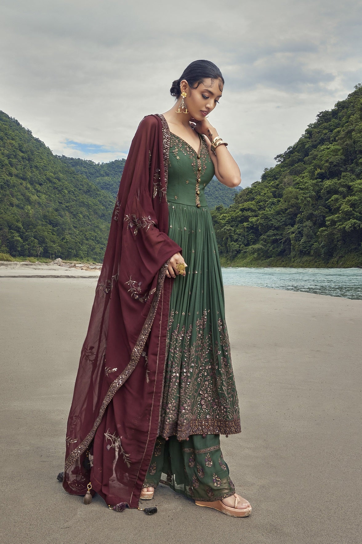 Buy a beautiful green anarkali embroidered georgette sharara suit with a dupatta. The suit is perfect for occasions like mehndi and festivals. Shop online from Pure Elegance. online in the USA with a dupatta. Dazzle on weddings and special occasions with exquisite Indian designer dresses, sharara suits, Anarkali suits, and wedding lehengas from Pure Elegance Indian fashion store in the USA.