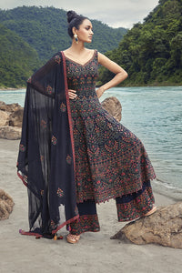 Buy a beautiful Navy anarkali embroidered georgette sharara suit with a dupatta. The suit is perfect for occasions like mehndi and festivals. Shop online from Pure Elegance. online in the USA with a dupatta. Dazzle on weddings and special occasions with exquisite Indian designer dresses, sharara suits, Anarkali suits, and wedding lehengas from Pure Elegance Indian fashion store in the USA.