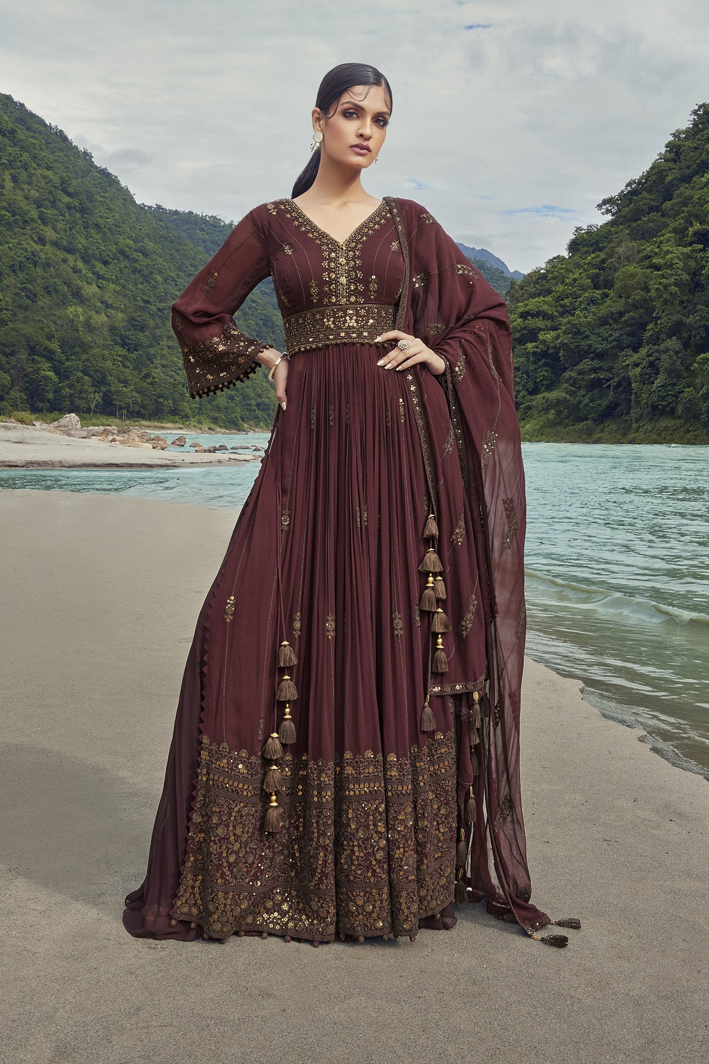 Buy a beautiful maroon embroidered georgette sharara suit with a dupatta. The suit is perfect for occasions like parties and festivals. Shop online from Pure Elegance. online in the USA with a dupatta. Dazzle on weddings and special occasions with exquisite Indian designer dresses, sharara suits, Anarkali suits, and wedding lehengas from Pure Elegance Indian fashion store in the USA.