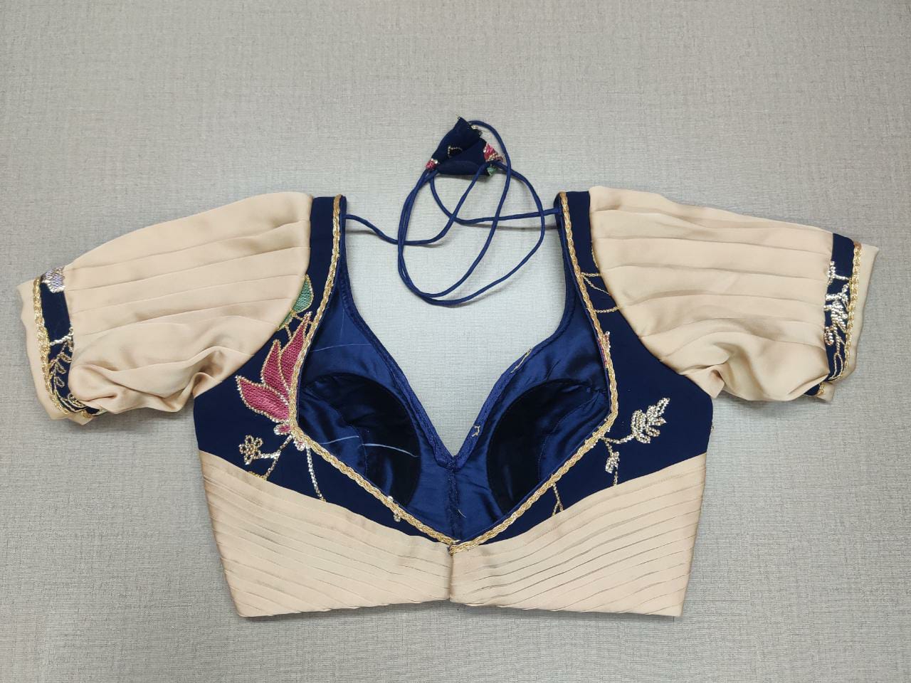 50w056 -RO - Off White and Navy Silk Blouse With Floral Design