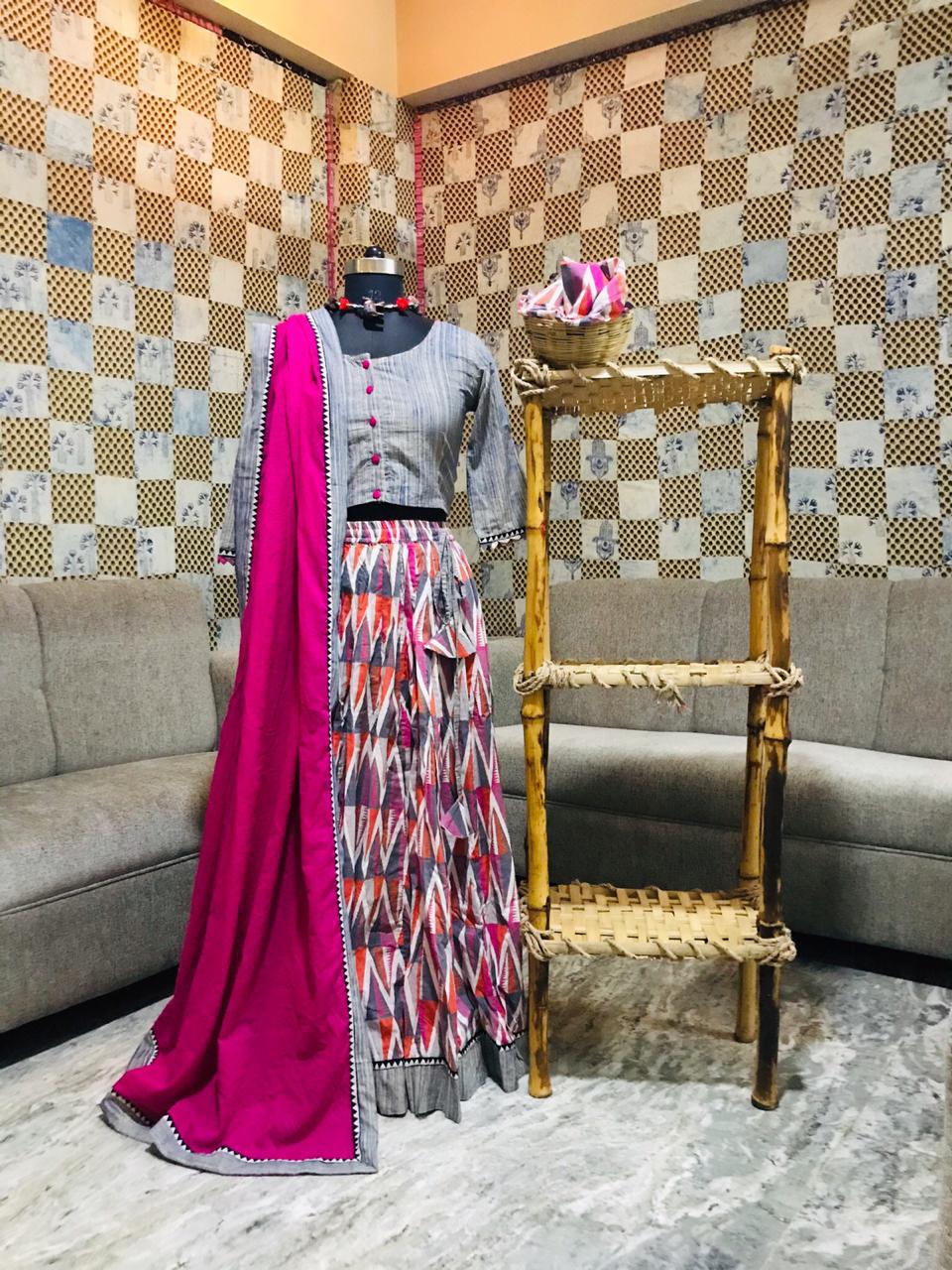 Shop stunning grey and pink cotton skirt set online in USA with pink dupatta. Elevate your ethnic style with a tasteful collection of designer Anarkali, designer salwar suits, Indian lehengas, sharara suits from Pure Elegance Indian clothing store in USA.-full view