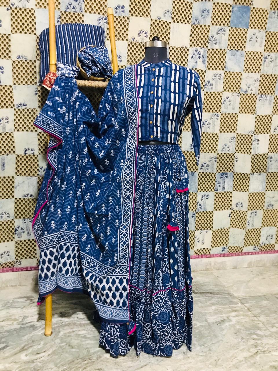 Buy stunning blue Bagru print cotton skirt set online in USA. Elevate your ethnic style with a tasteful collection of designer Anarkali suits, designer salwar suits, Indian lehengas, sharara suits from Pure Elegance Indian clothing store in USA.-front