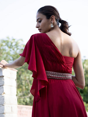 Shop beautiful red georgette one shoulder gown online in USA. Dazzle on weddings and special occasions with exquisite Indian designer dresses, sharara suits, Anarkali suits, wedding lehengas from Pure Elegance Indian fashion store in USA.-back
