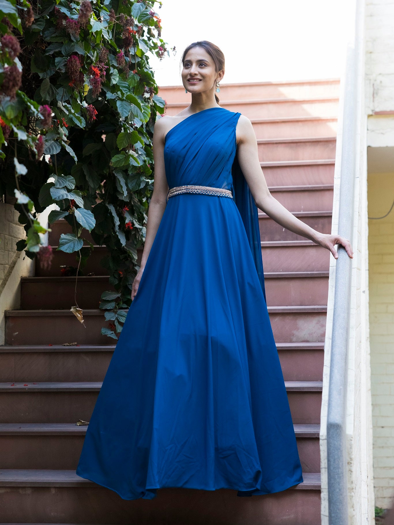 Shop stunning prussian blue gown online in USA with embellished belt. Dazzle on weddings and special occasions with exquisite Indian designer dresses, sharara suits, Anarkali suits, wedding lehengas from Pure Elegance Indian fashion store in USA.-full view