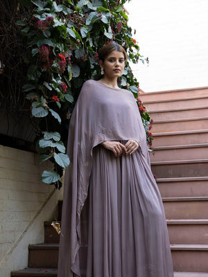 Buy stunning grey georgette jumpsuit online in USA with cape sleeves. Dazzle on weddings and special occasions with exquisite Indian designer dresses, sharara suits, Anarkali suits, wedding lehengas from Pure Elegance Indian fashion store in USA.-front