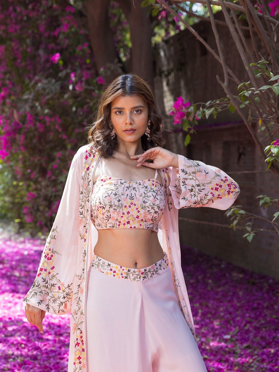 Shop stunning powder pink embroidered crop top with palazzo online in USA and jacket. Dazzle on weddings and special occasions with exquisite Indian designer dresses, sharara suits, Anarkali suits, wedding lehengas from Pure Elegance Indian fashion store in USA.-closeup