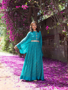Buy beautiful teal blue printed maxi dress online in USA. Dazzle on weddings and special occasions with exquisite Indian designer dresses, sharara suits, Anarkali suits, wedding lehengas from Pure Elegance Indian fashion store in USA.-full view
