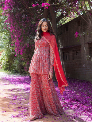 Buy gorgeous red drop print sharara suit online in USA with embellished front. Dazzle on weddings and special occasions with exquisite Indian designer dresses, sharara suits, Anarkali suits, wedding lehengas from Pure Elegance Indian fashion store in USA.-front