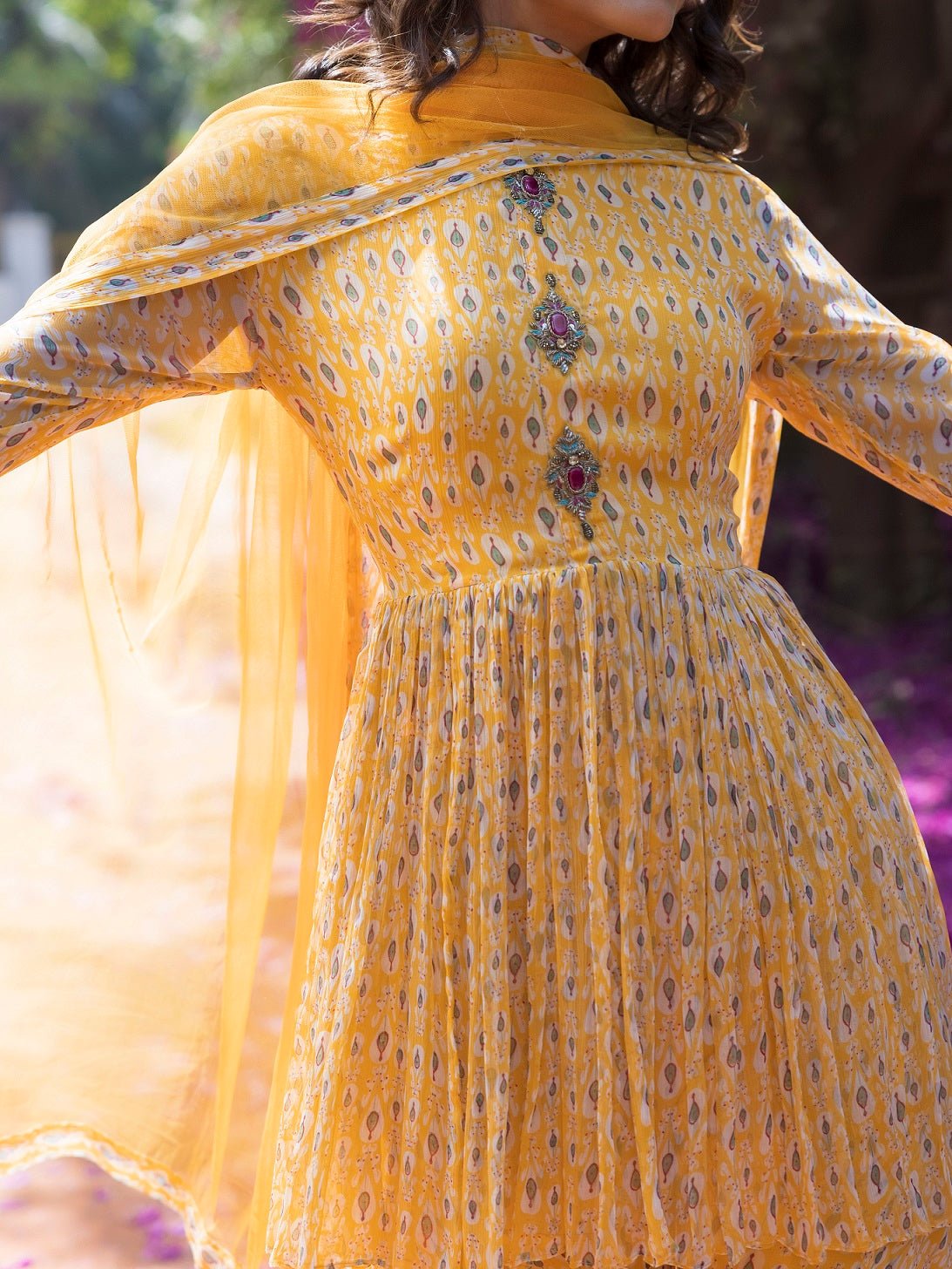 Shop beautiful yellow drop print sharara suit online in USA with embellished front. Dazzle on weddings and special occasions with exquisite Indian designer dresses, sharara suits, Anarkali suits, wedding lehengas from Pure Elegance Indian fashion store in USA.-closeup