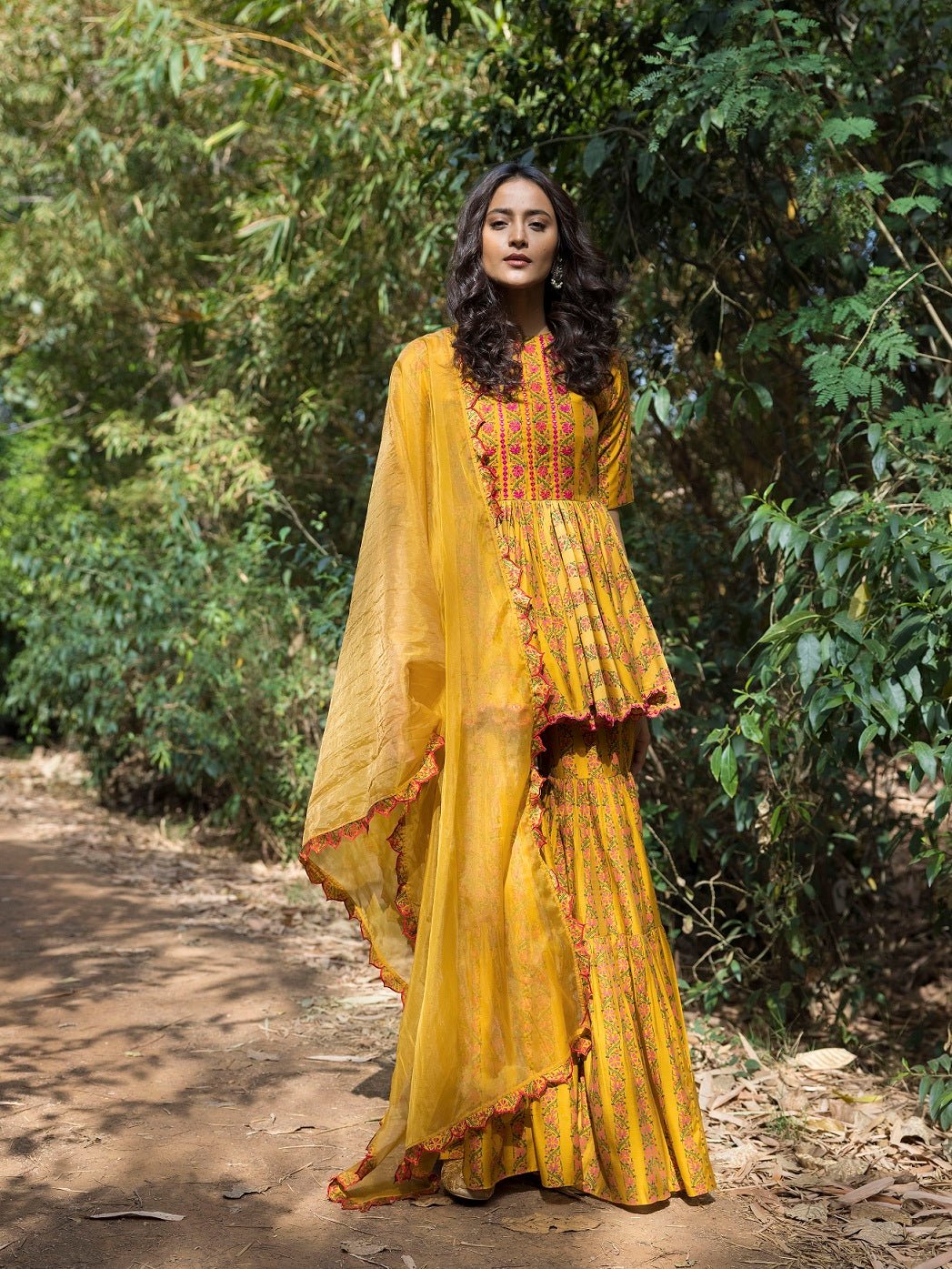 Buy beautiful mustard blossom print sharara suit online in USA. Dazzle on weddings and special occasions with exquisite Indian designer dresses, sharara suits, Anarkali suits, wedding lehengas from Pure Elegance Indian fashion store in USA.-sharara