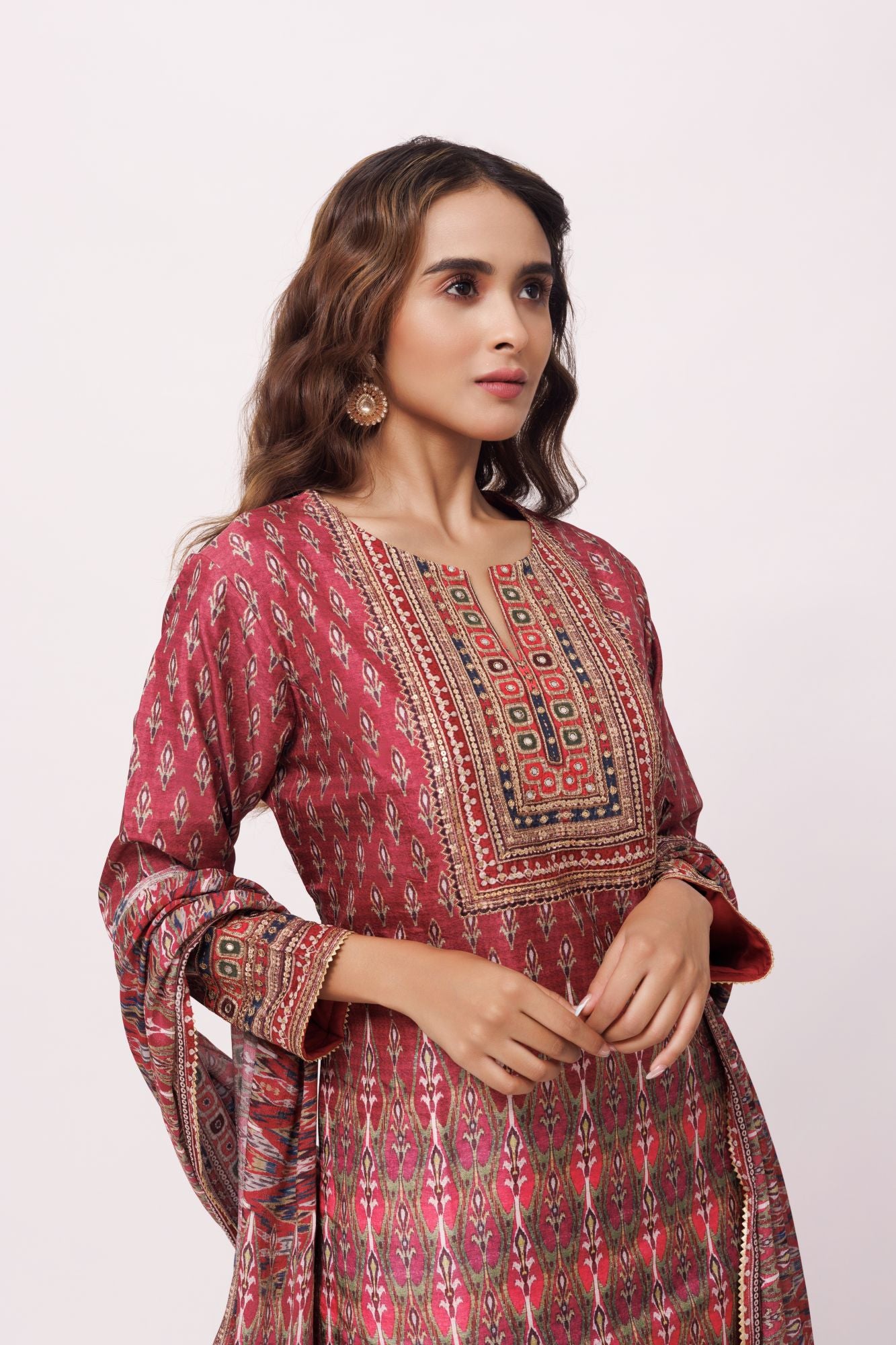Buy burnt umber printed crepe pant suit online in USA with dupatta. Dazzle on weddings and special occasions with exquisite Indian designer dresses, sharara suits, Anarkali suits, wedding lehengas from Pure Elegance Indian fashion store in USA.-closeup