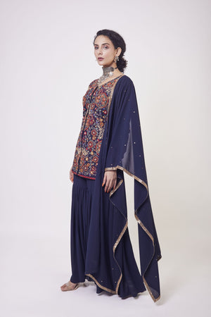Buy royal blue resham and zardozi work gharara suit in USA with dupatta. Dazzle on weddings and special occasions with exquisite Indian designer dresses, sharara suits, Anarkali suits, wedding lehengas from Pure Elegance Indian fashion store in USA.-side