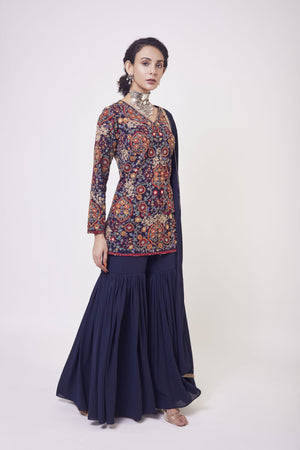 Buy royal blue resham and zardozi work gharara suit in USA with dupatta. Dazzle on weddings and special occasions with exquisite Indian designer dresses, sharara suits, Anarkali suits, wedding lehengas from Pure Elegance Indian fashion store in USA.-right