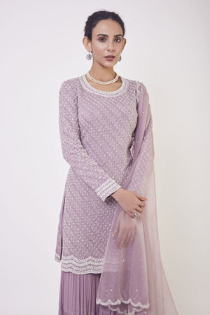 Shop lilac resham and cutdana work gharara suit in USA with dupatta. Dazzle on weddings and special occasions with exquisite Indian designer dresses, sharara suits, Anarkali suits, wedding lehengas from Pure Elegance Indian fashion store in USA.-closeup