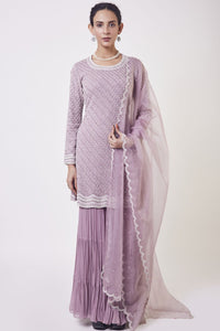 Shop lilac resham and cutdana work gharara suit in USA with dupatta. Dazzle on weddings and special occasions with exquisite Indian designer dresses, sharara suits, Anarkali suits, wedding lehengas from Pure Elegance Indian fashion store in USA.-full view