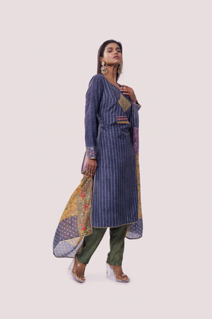 Shop blue striped chanderi suit in USA with green pants. Dazzle on weddings and special occasions with exquisite Indian designer dresses, sharara suits, Anarkali suits, wedding lehengas from Pure Elegance Indian fashion store in USA.-right