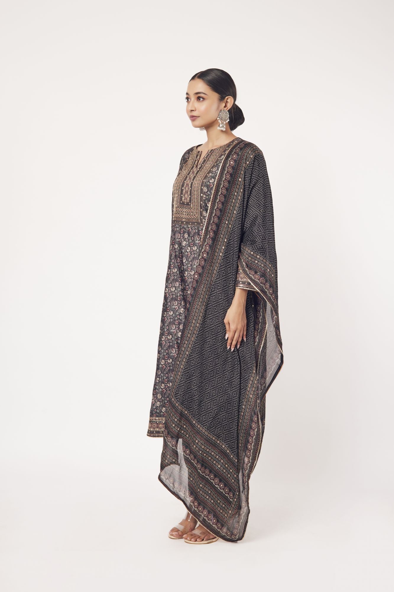Shop stunning black printed crepe suit online in USA with dupatta. Dazzle on weddings and special occasions with exquisite Indian designer dresses, sharara suits, Anarkali suits, wedding lehengas from Pure Elegance Indian fashion store in USA.-dupatta