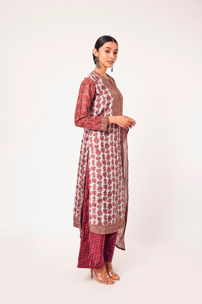 Buy powder blue and red printed crepe suit online in USA with dupatta. Dazzle on weddings and special occasions with exquisite Indian designer dresses, sharara suits, Anarkali suits, wedding lehengas from Pure Elegance Indian fashion store in USA.-right