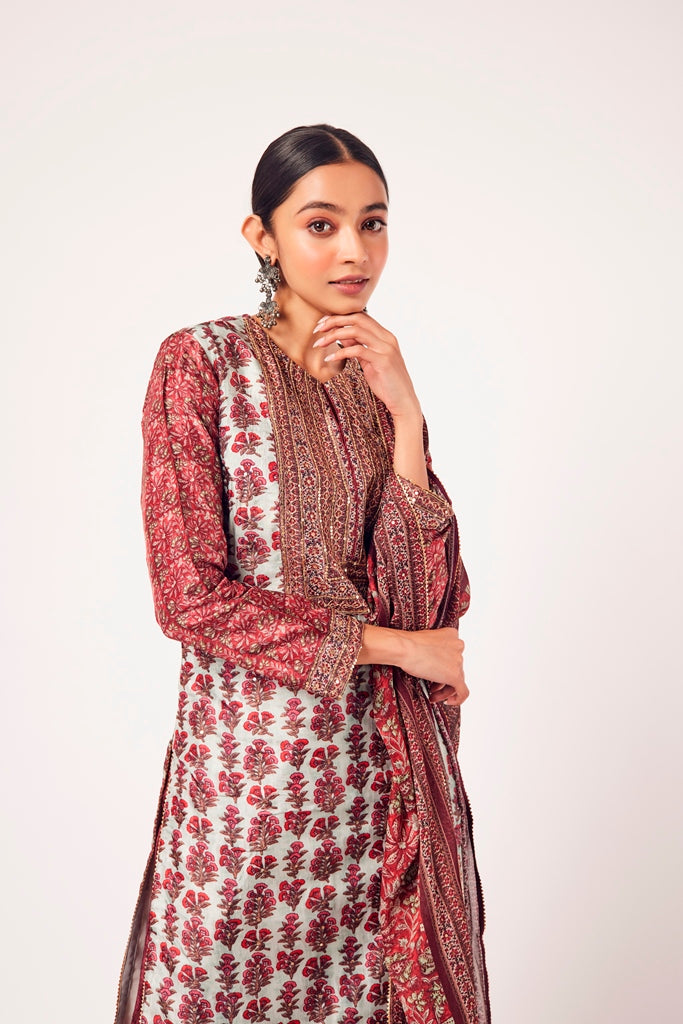 Buy powder blue and red printed crepe suit online in USA with dupatta. Dazzle on weddings and special occasions with exquisite Indian designer dresses, sharara suits, Anarkali suits, wedding lehengas from Pure Elegance Indian fashion store in USA.-closeup