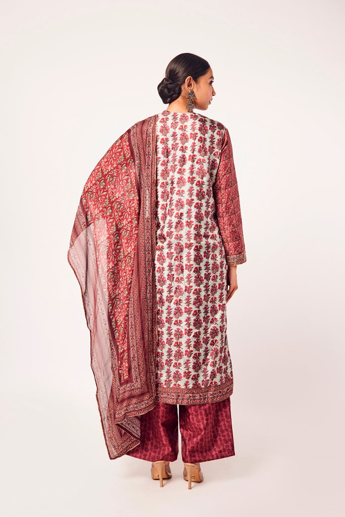 Buy powder blue and red printed crepe suit online in USA with dupatta. Dazzle on weddings and special occasions with exquisite Indian designer dresses, sharara suits, Anarkali suits, wedding lehengas from Pure Elegance Indian fashion store in USA.-back