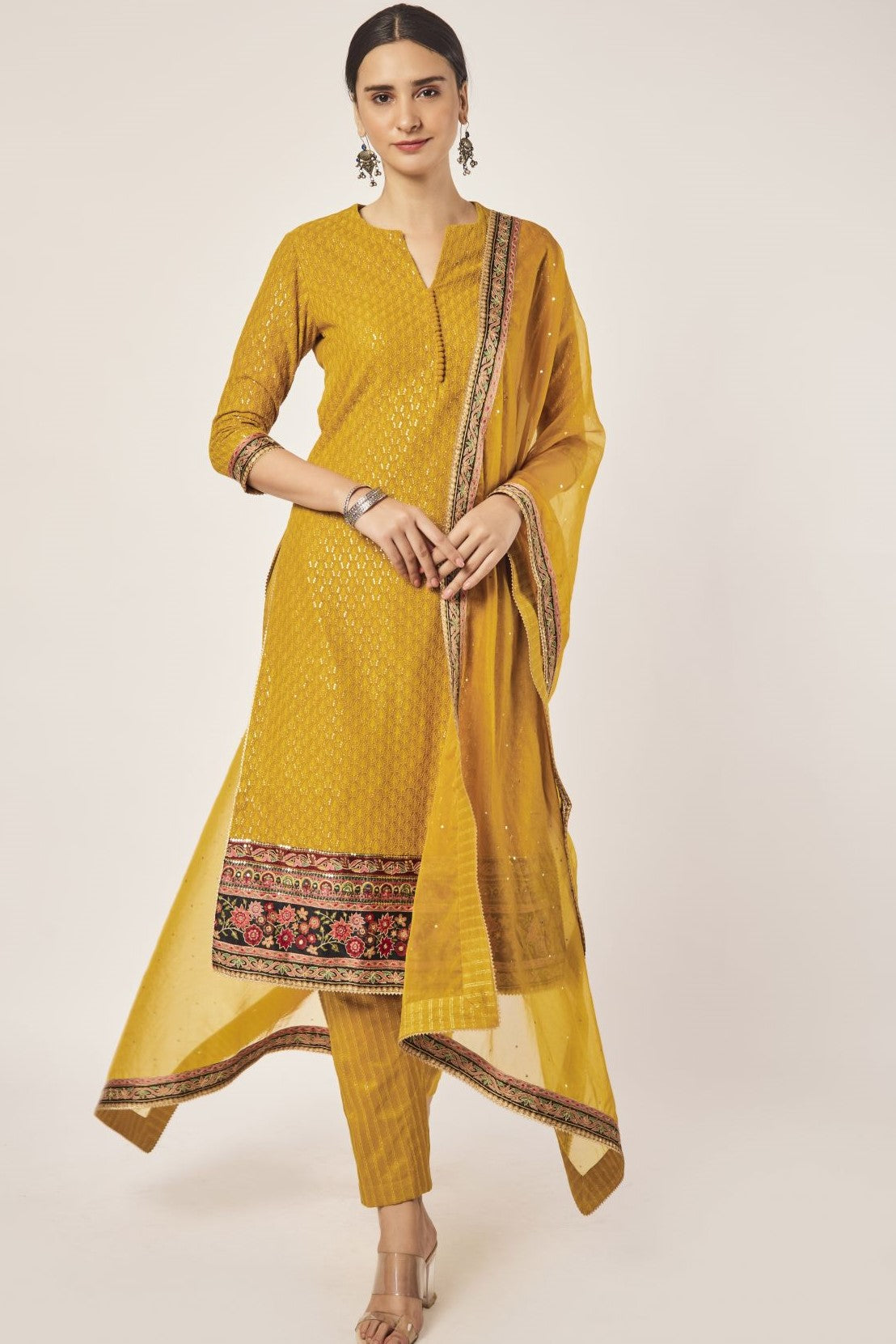 Shop beautiful mustard tikki and aari work georgette suit online in USA with dupatta. Dazzle on weddings and special occasions with exquisite Indian designer dresses, sharara suits, Anarkali suits, wedding lehengas from Pure Elegance Indian fashion store in USA.-full view
